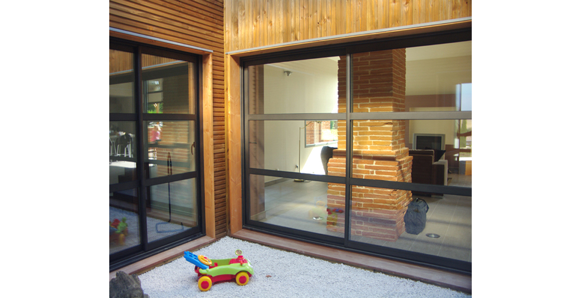 Construction d'une maison en ossature bois sous une ancienne grange "Lauraguaise".