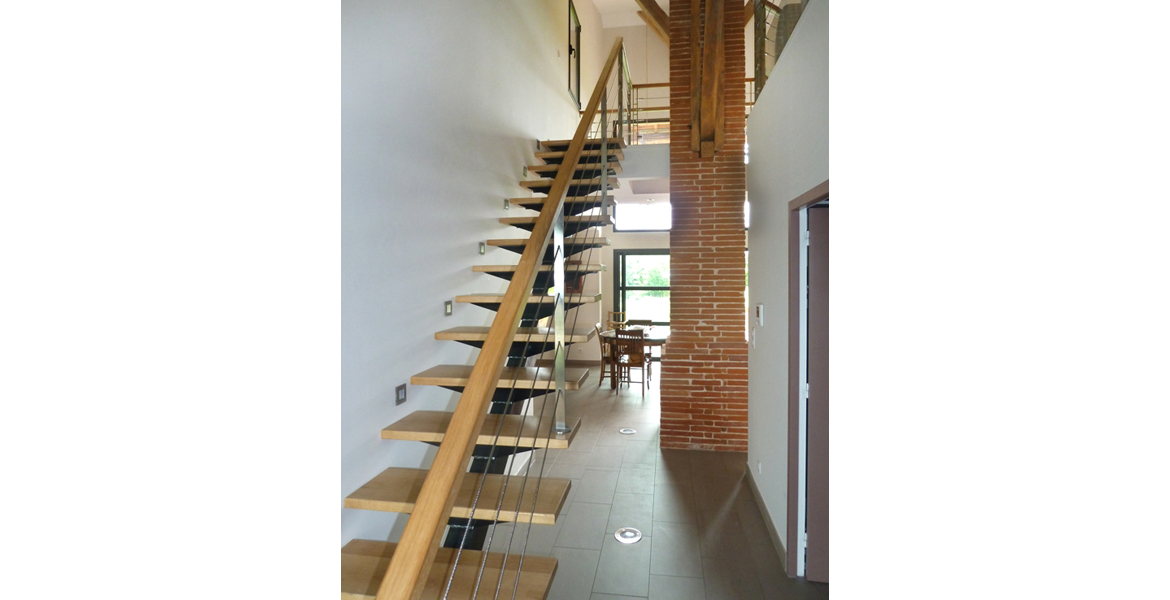 Construction d'une maison en ossature bois sous une ancienne grange "Lauraguaise".