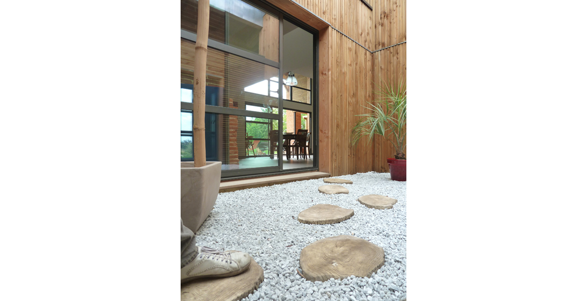 Construction d'une maison en ossature bois sous une ancienne grange "Lauraguaise".