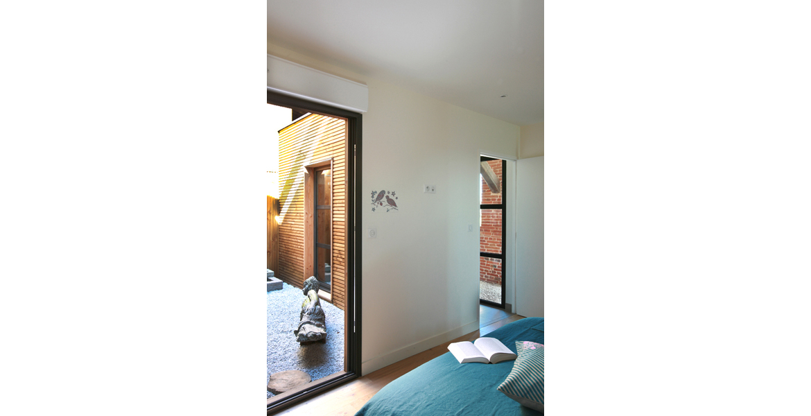 Construction d'une maison en ossature bois sous une ancienne grange "Lauraguaise".