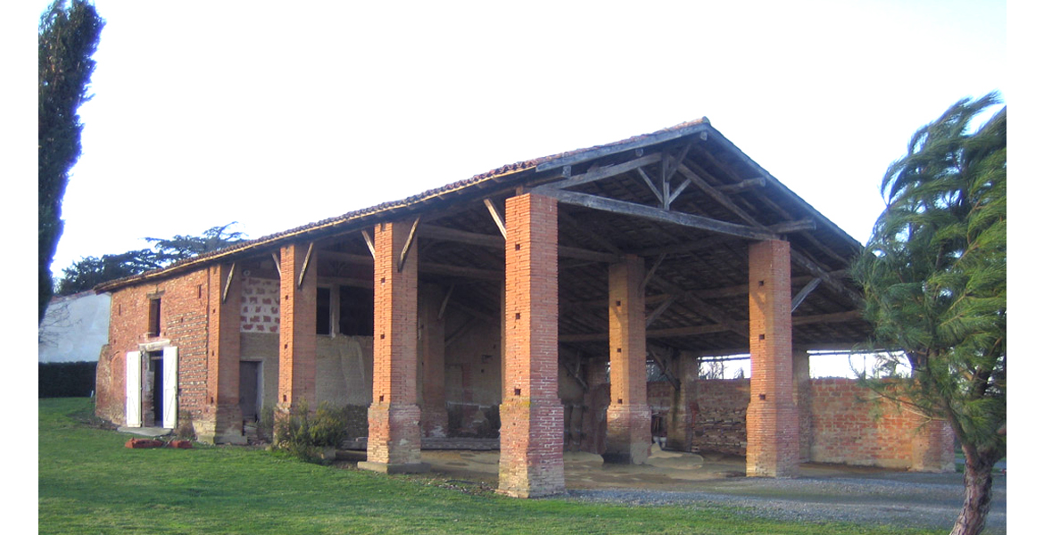 Construction d'une maison en ossature bois sous une ancienne grange "Lauraguaise".