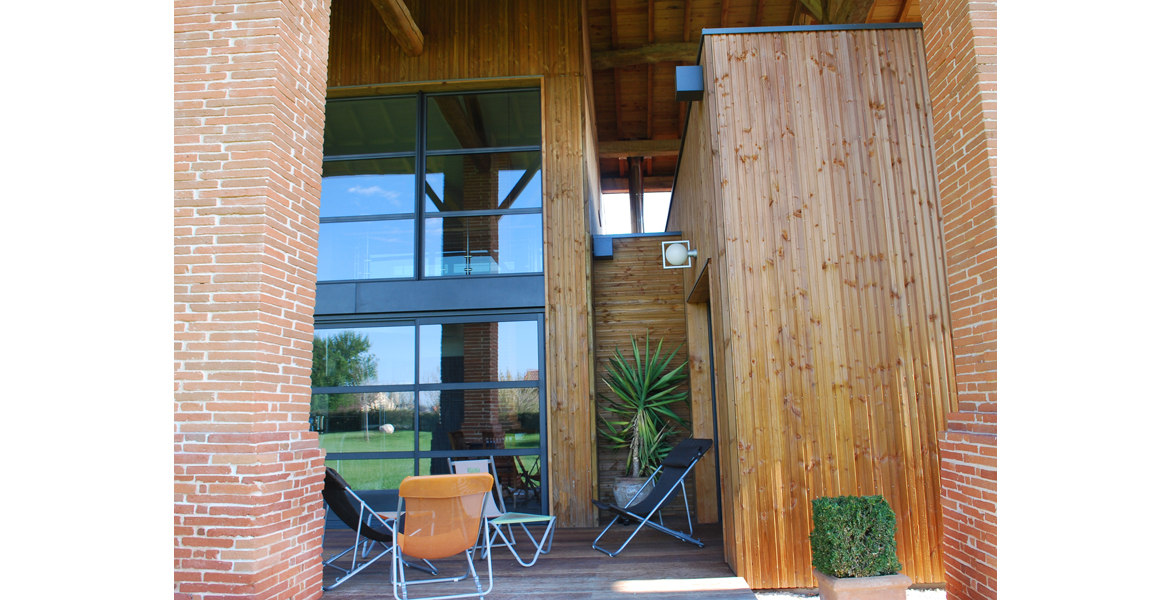 Construction d'une maison en ossature bois sous une ancienne grange "Lauraguaise".